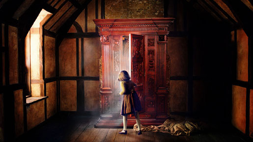 Image shows Lucy in a room. She is about to enter the magical wardrobe. The wardrobe has its doors opened and an inviting whit light.